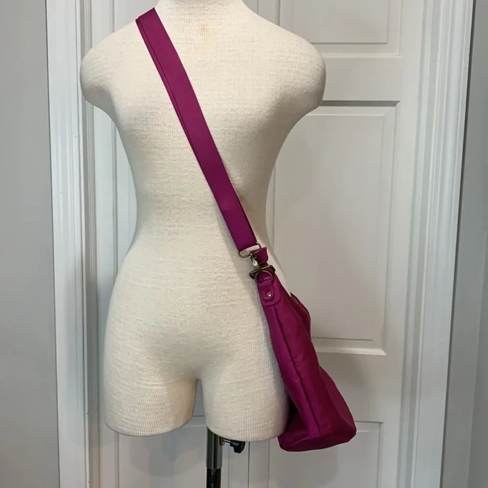 Travelon magenta cloth purse withh adjustable strap